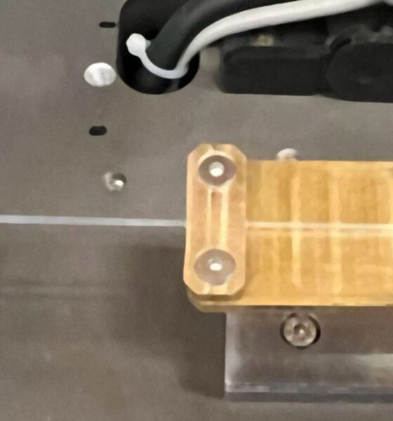 Laboratory experiment showing a stretchable polymer fibre demonstrating stretchable material heat conduction as its thermal behaviour changes when the material is stretched.