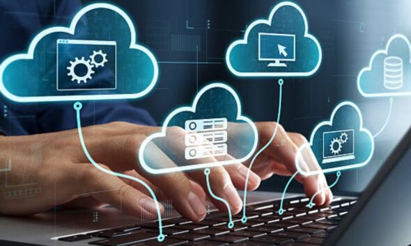 Illustration of cloud computing services with interconnected cloud icons, servers, software, and computer systems displayed above a person typing on a laptop keyboard.