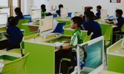 Students use desktop computers during a computer in a school laboratory.