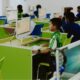 Students use desktop computers during a computer in a school laboratory.