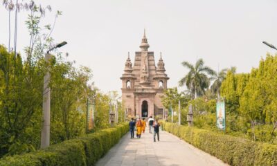 Visitors walk towards the Mulagandha Kuti Vihara Temple in Sarnath, Uttar Pradesh, recently inscribed as India's 45th UNESCO World Heritage Site.
