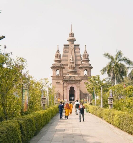 Visitors walk towards the Mulagandha Kuti Vihara Temple in Sarnath, Uttar Pradesh, recently inscribed as India's 45th UNESCO World Heritage Site.