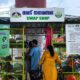 People browse donated clothes and household items at the Maradu Nagarasabha Swap Shop, a community reuse centre promoting recycling and sustainable consumption in Kerala.