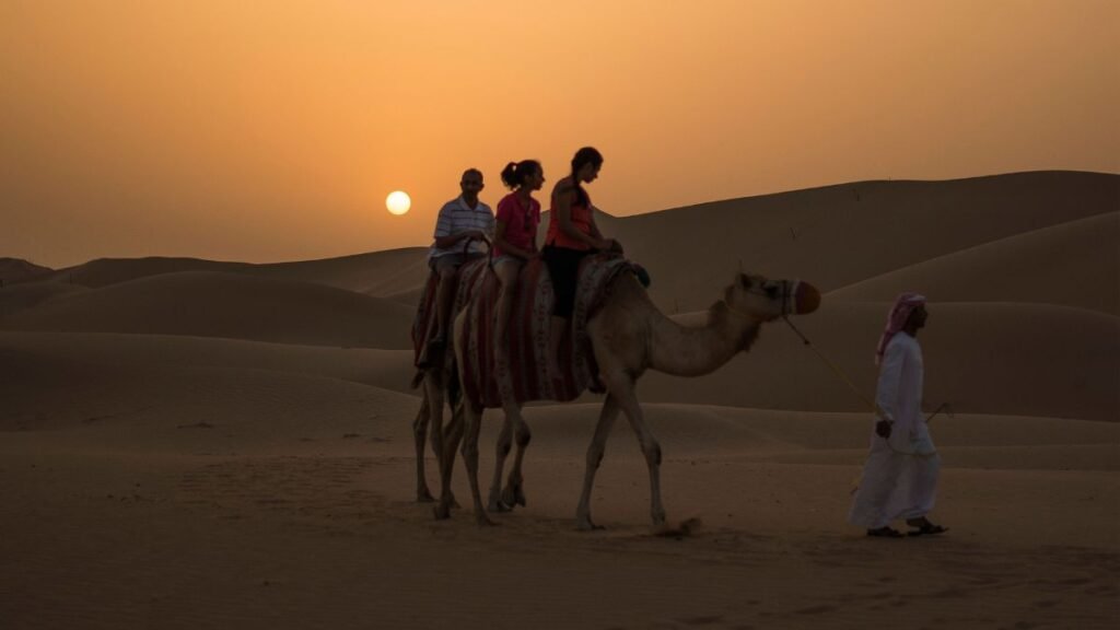 Travelling through sand dunes in the desert.