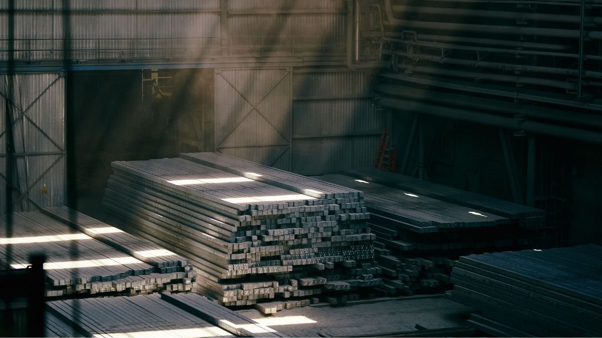 Steel bars stacked at an Indian steel manufacturing facility, representing steel exports facing EU CBAM requirements
