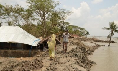 Riverbank erosion threatening homes and livelihoods along a flood-prone riverbank.
