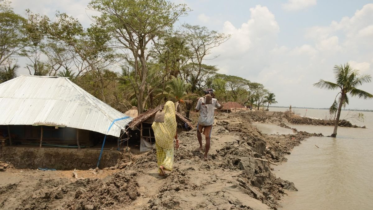 Riverbank erosion threatening homes and livelihoods along a flood-prone riverbank.
