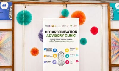 Decarbonisation Advisory Clinic booth showcasing low-carbon solutions, clean energy, EV logistics and sustainability services at the Tiruppur Knit Show.