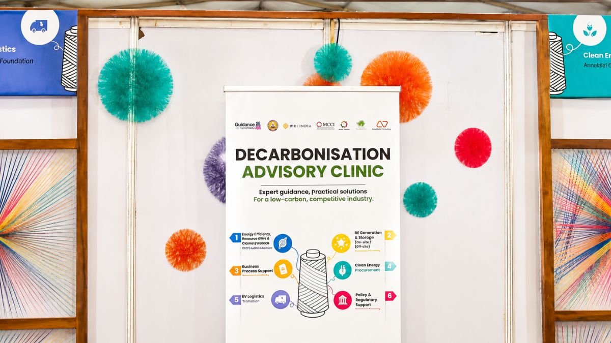 Decarbonisation Advisory Clinic booth showcasing low-carbon solutions, clean energy, EV logistics and sustainability services at the Tiruppur Knit Show.