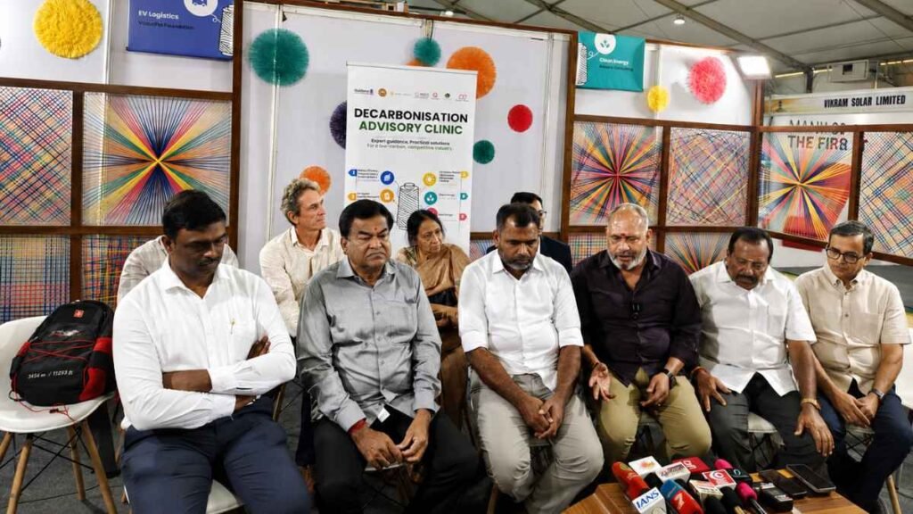 Industry representatives and experts seated at the inaugural event of the Decarbonisation Advisory Clinic at the Tiruppur Knit Show.