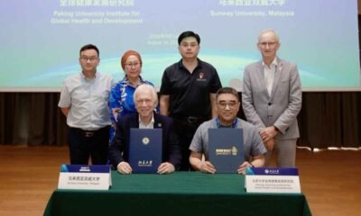 Peking University and Sunway University representatives sign a five-year planetary health MoU in Beijing