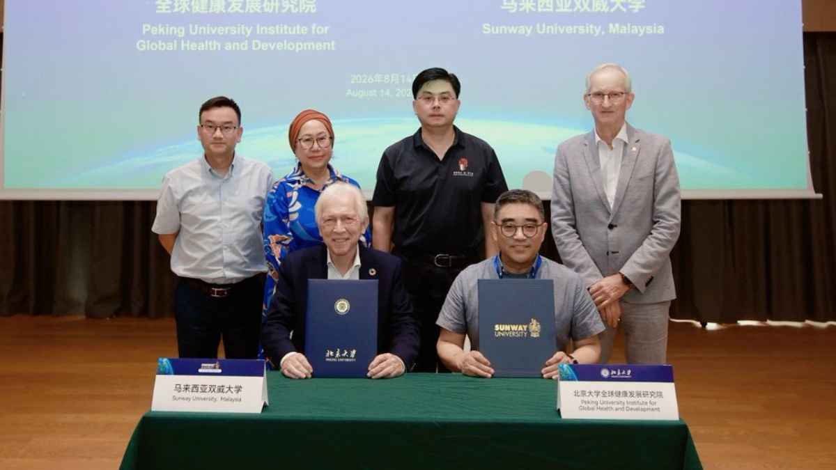 Peking University and Sunway University representatives sign a five-year planetary health MoU in Beijing