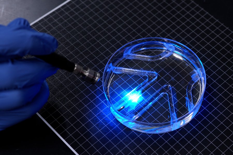 MIT engineers demonstrate a soft robot powered by living muscle cells responding to blue light.