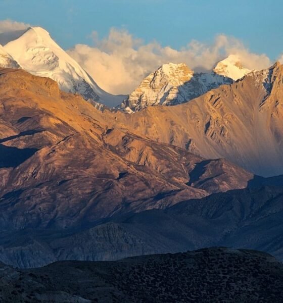 Snow-covered Himalayas and rugged slopes, illustrating the region’s growing vulnerability to climate and geological hazards.