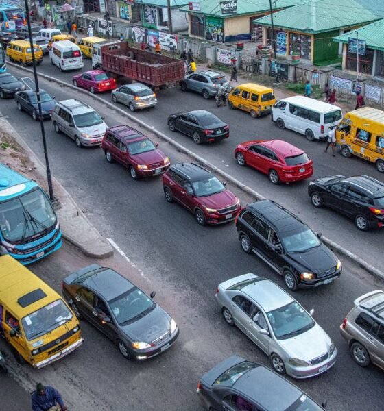 Busy Indian city road with cars and commercial vehicles, illustrating India’s changing passenger-vehicle market
