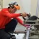 Skilled worker operating industrial machinery during technical training