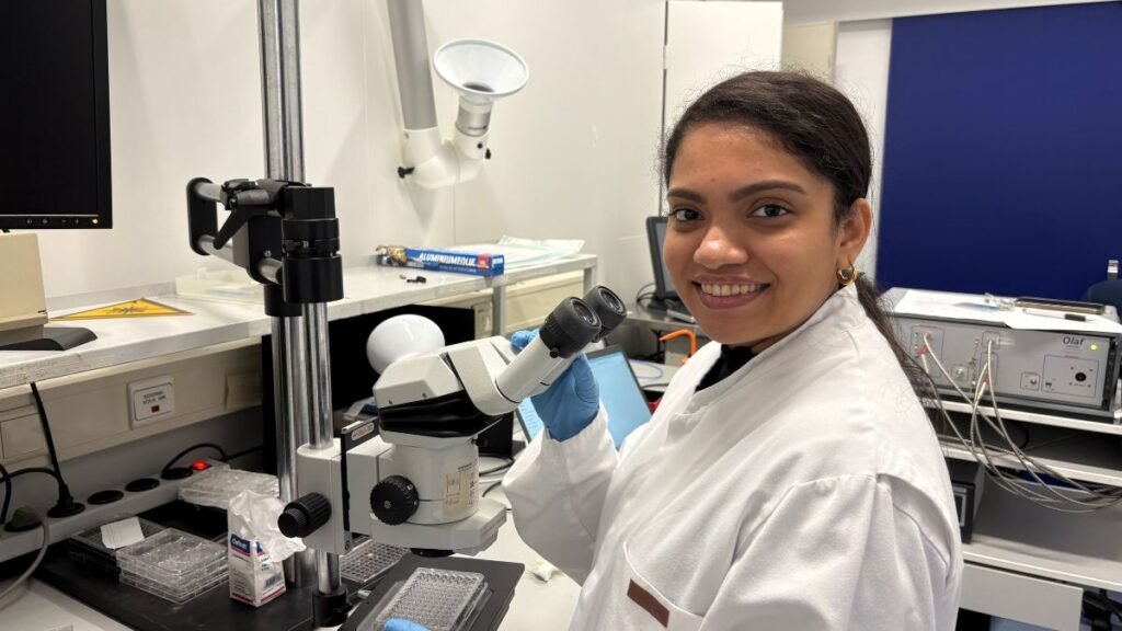 Anjali Thomas conducting research with laboratory equipment for photoacoustic imaging