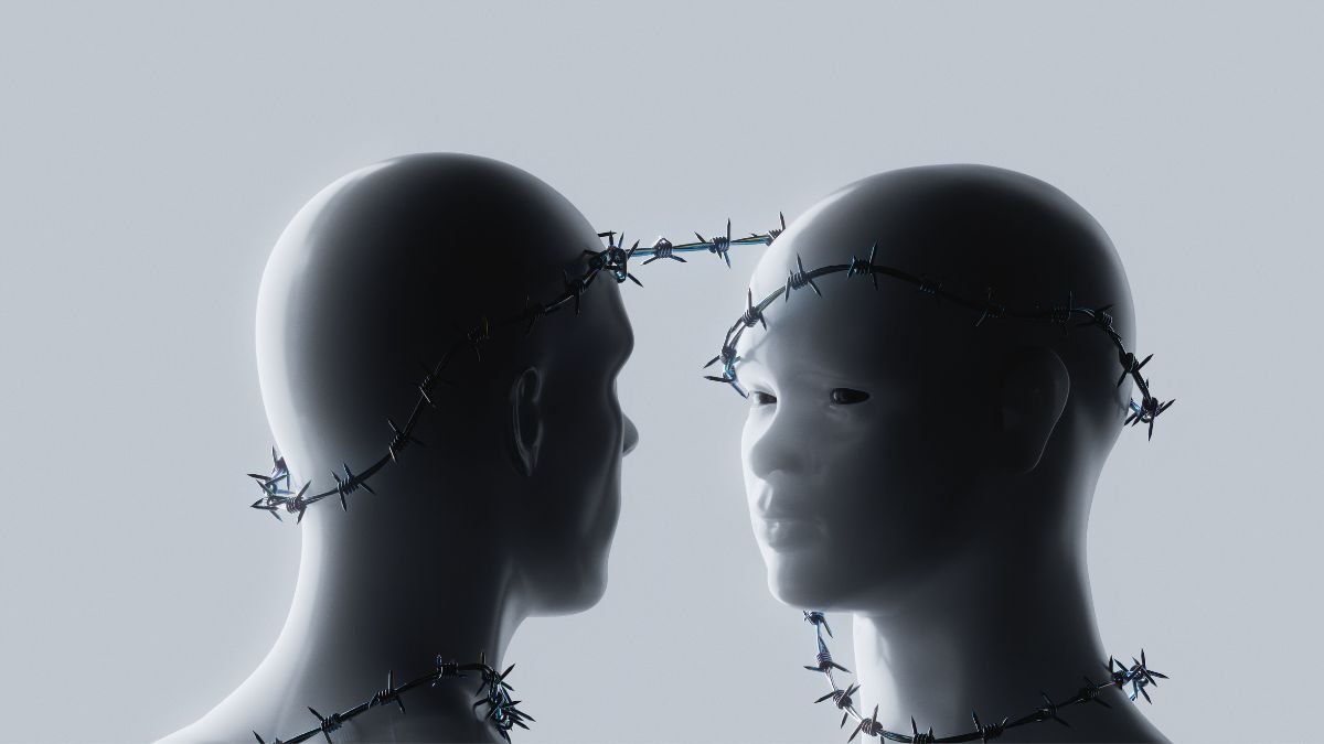 Conceptual image of two humanoid figures facing each other with barbed wire around their heads and necks, representing AI risks and safety constraints.
