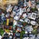 Aerial view of a scrap yard filled with discarded metal, wires and machinery parts, illustrating the scale of India’s growing waste management challenge