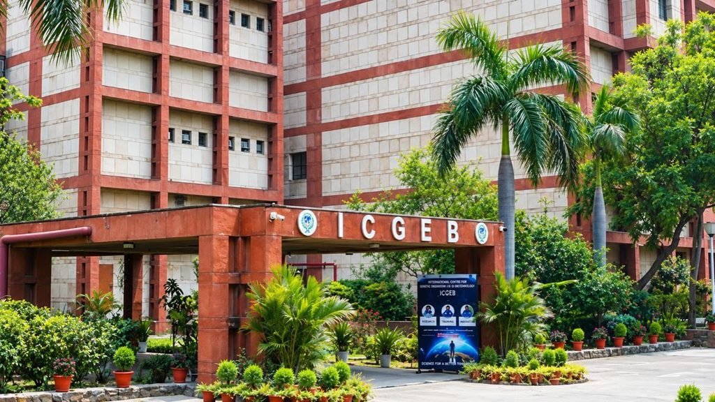 ESTIC 2026: Exterior view of the International Centre for Genetic Engineering and Biotechnology (ICGEB) building in New Delhi, with its entrance sign and landscaped gardens.