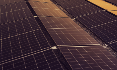 Close-up view of photovoltaic solar panels arranged in rows, illustrating solar energy generation and renewable energy technology.