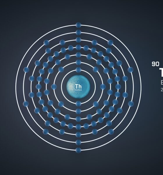 Scientific illustration of a thorium atom showing its nucleus at the centre and electrons arranged in concentric shells.